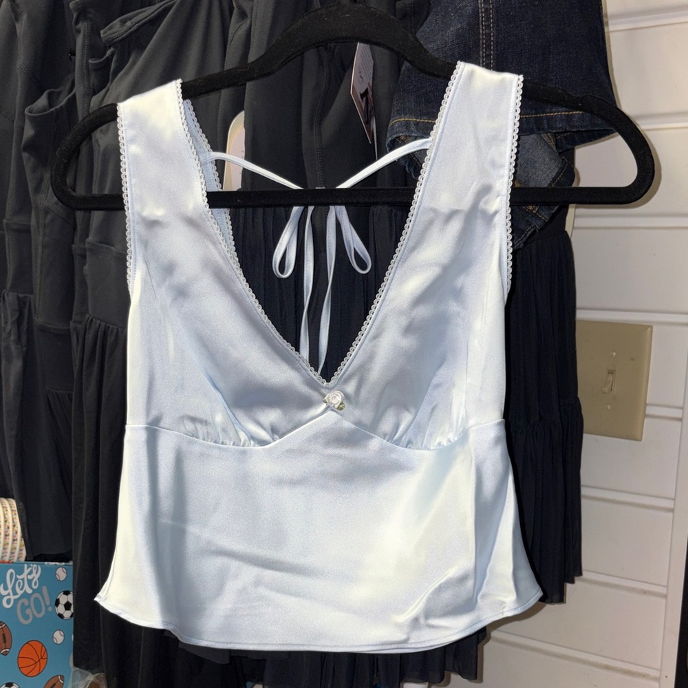 5/$10 New item.. Light Blue Satin Sleeveless Top